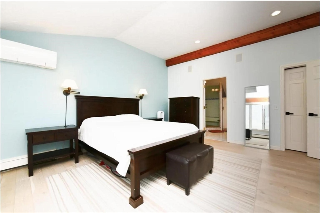 31 Ellisville Road Plymouth, MA 02360 - Photo 18 of 40 a spacious bedroom with a bed and wooden floor