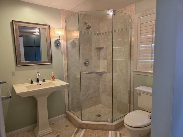 31 Ellisville Road Plymouth, MA 02360 - Photo 21 of 40 a bathroom with a shower a toilet and sink