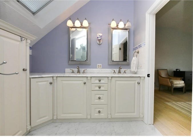 31 Ellisville Road Plymouth, MA 02360 - Photo 23 of 40 a bathroom with a double vanity sink and a mirror