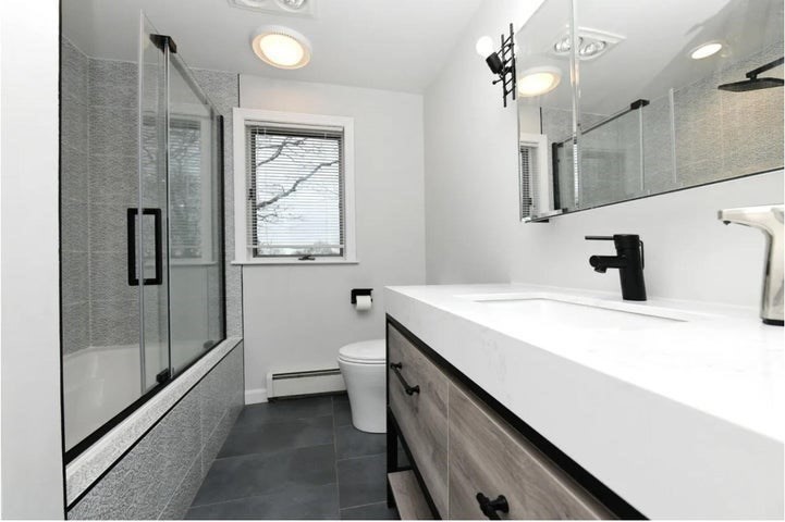 31 Ellisville Road Plymouth, MA 02360 - Photo 24 of 40 a bathroom with a sink a toilet and shower