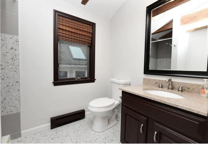 31 Ellisville Road Plymouth, MA 02360 - Photo 25 of 40 a bathroom with a toilet sink and mirror