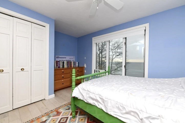 31 Ellisville Road Plymouth, MA 02360 - Photo 28 of 40 a bed sitting in a bedroom next to a window