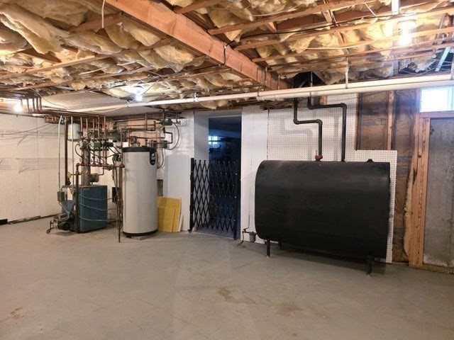 31 Ellisville Road Plymouth, MA 02360 - Photo 31 of 40 a view of a storage room with a lot of stuff