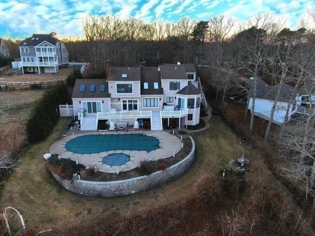31 Ellisville Road Plymouth, MA 02360 - Photo 40 of 40 a view of a house with a yard and sitting space