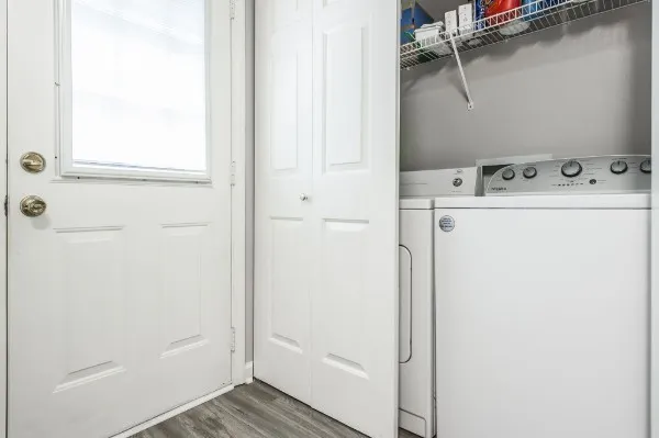 a utility room with dryer and washer