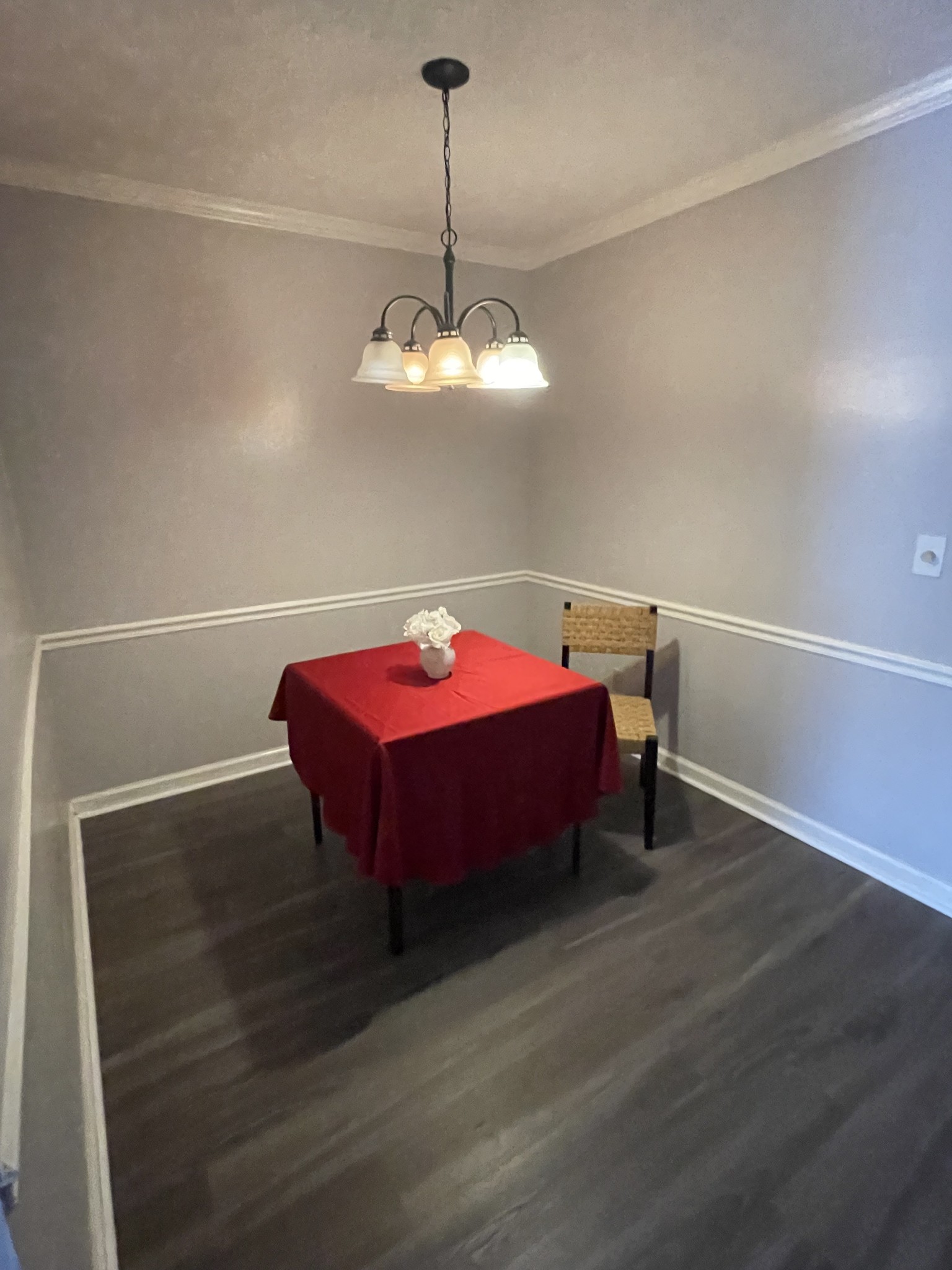 430 Walton Ferry Road, Unit 807 Hendersonville, TN 37075 - Photo 7 of 24 a bedroom with a bed and a chandelier