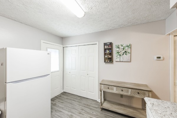 430 Walton Ferry Road, Unit 807 Hendersonville, TN 37075 - Photo 10 of 24 a view of kitchen with a refrigerator a stove a microwave and white cabinets