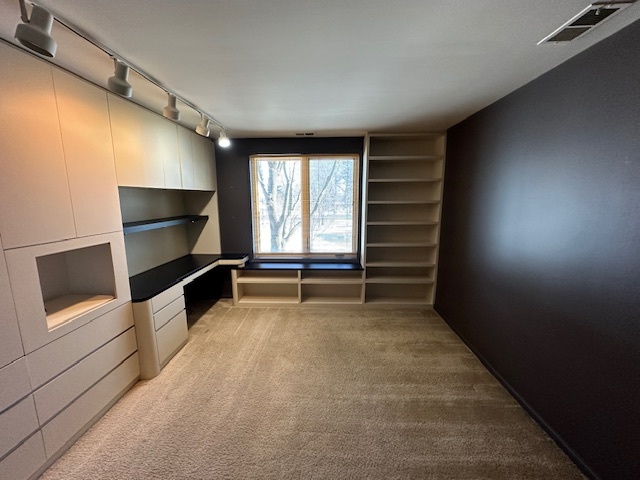1125 Lake Cook Road, Unit 203E Northbrook, IL 60062 - Photo 11 of 13 a view of room with a flat screen tv on the wall