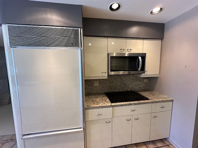 1125 Lake Cook Road, Unit 203E Northbrook, IL 60062 - Photo 7 of 13 a close view of kitchen with a sink and dishwasher a oven with wooden floor