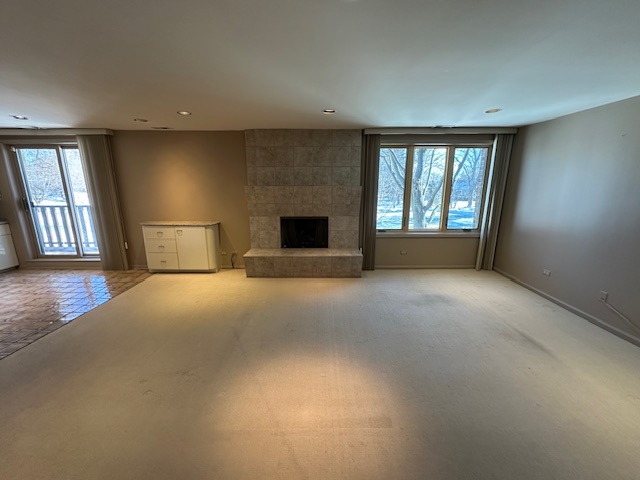 1125 Lake Cook Road, Unit 203E Northbrook, IL 60062 - Photo 8 of 13 a view of empty room with a fireplace