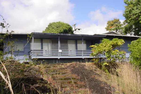 1486 A Akala Road Hilo, HI 96720 - Photo 3 of 5 a backyard of a house with lots of green space