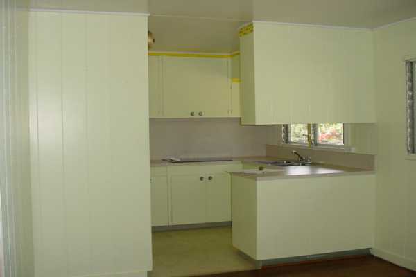 1486 A Akala Road Hilo, HI 96720 - Photo 4 of 5 a kitchen with a sink and cabinets