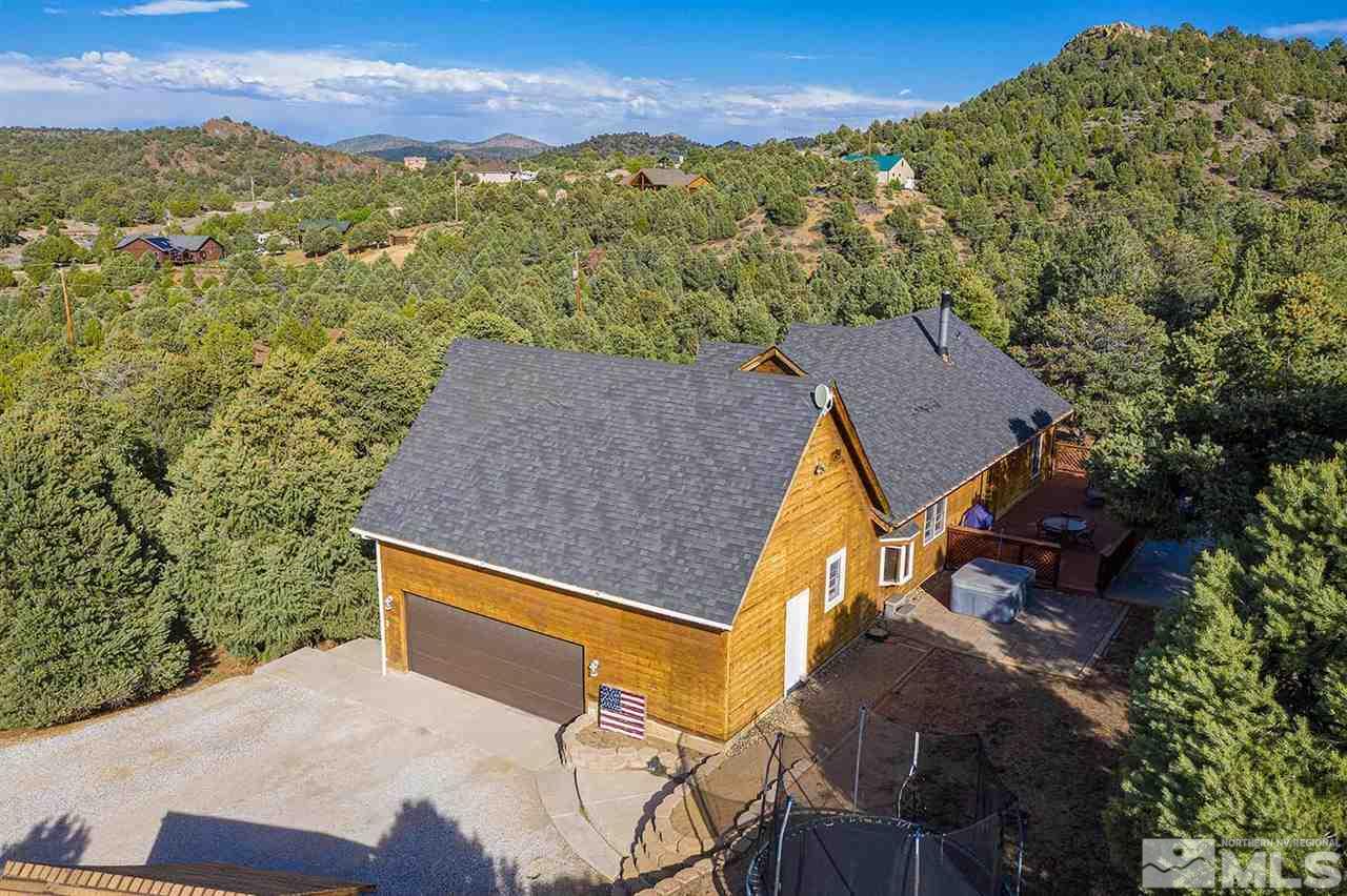 21861 Bowie Road Reno, NV 89521 - Photo 3 of 25 a view of a house with a mountain