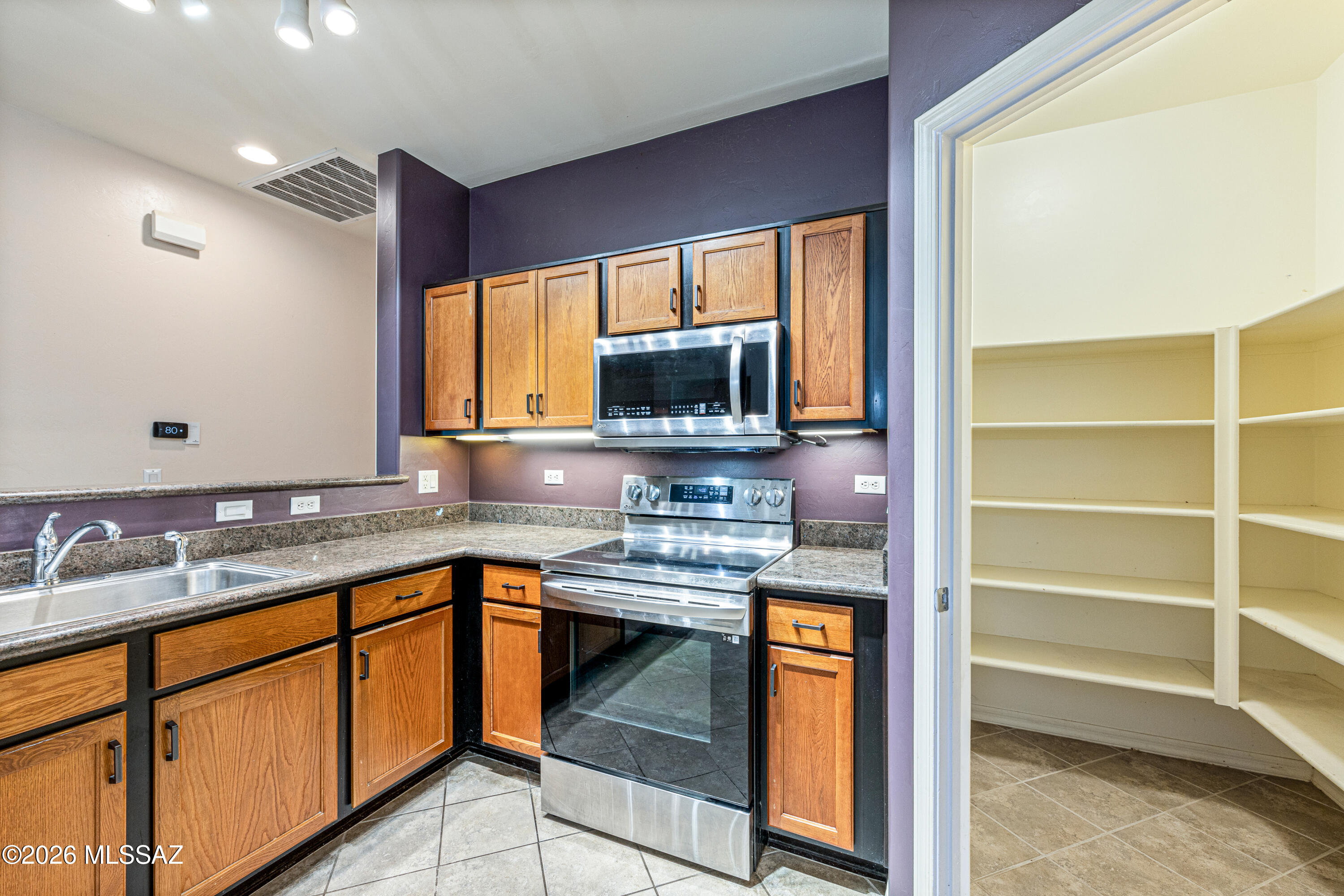 38946 South Running Roses Lane Tucson, AZ 85739 - Photo 14 of 36 Large Walk in Pantry