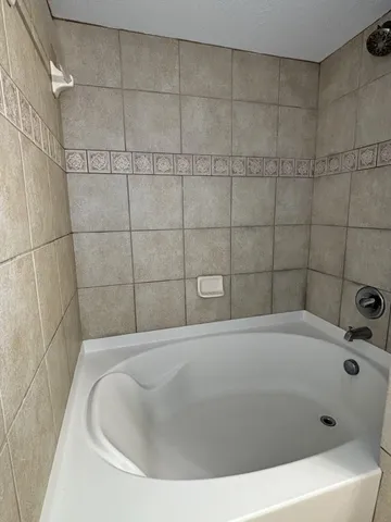a bathroom with a tub