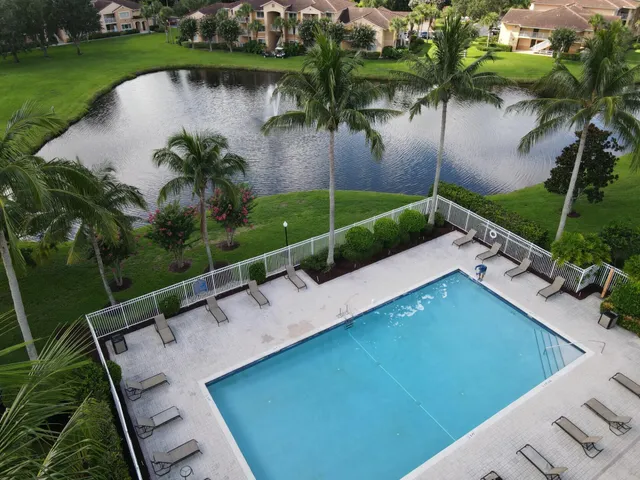 a view of a backyard with a lake view