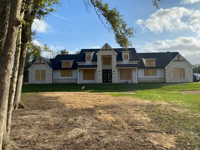 16915 Hamill Drive Rosharon, TX 77583 - Photo 45 of 47 a front view of a house with garden