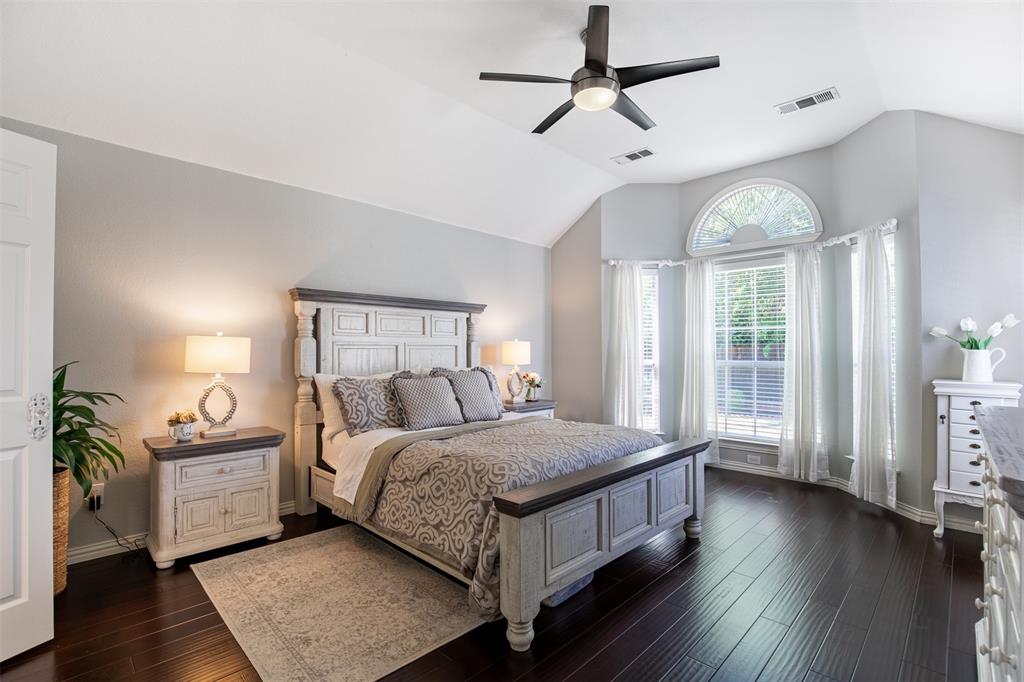 6425 Radslow Drive Frisco, TX 75035 - Photo 18 of 34 Primary suite with sloped ceiling and bay windows.