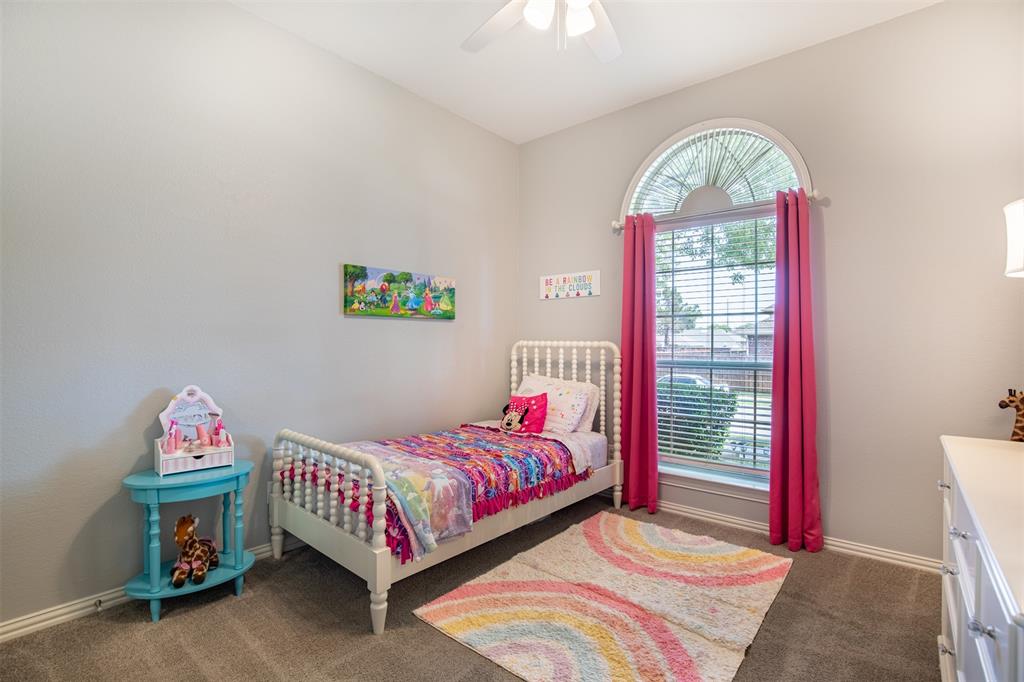 6425 Radslow Drive Frisco, TX 75035 - Photo 23 of 34 Secondary bedroom with ceiling fan.
