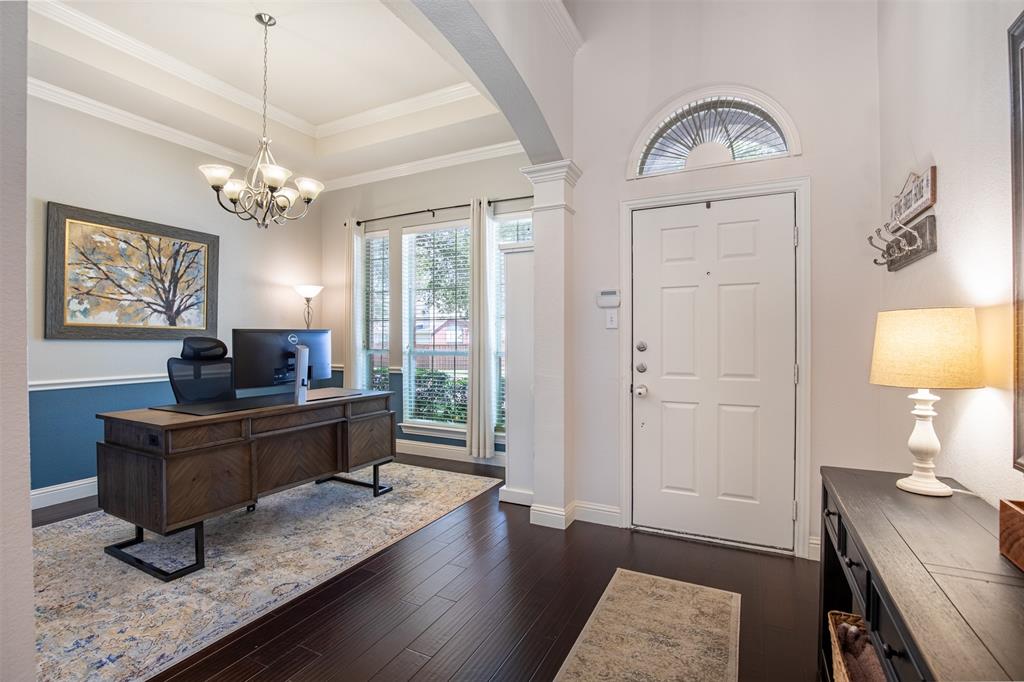 6425 Radslow Drive Frisco, TX 75035 - Photo 3 of 34 Open concept entry with architectural detailing & wood flooring.