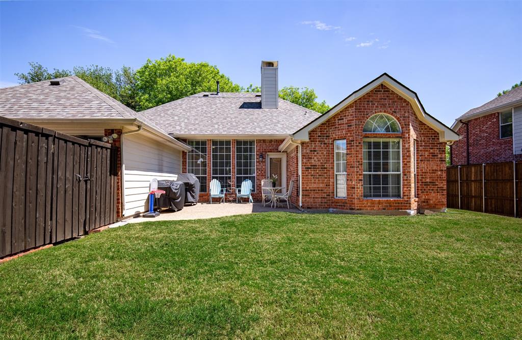 6425 Radslow Drive Frisco, TX 75035 - Photo 32 of 34 Backyard with gate leading to 2 car garage.