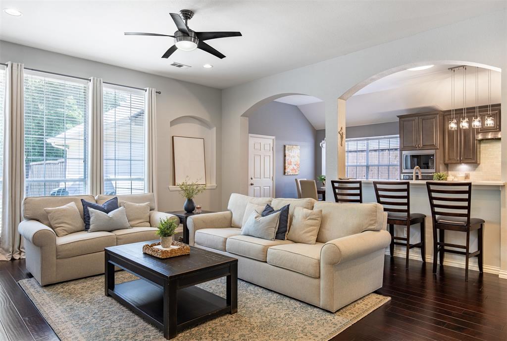 6425 Radslow Drive Frisco, TX 75035 - Photo 4 of 34 Living room features architectural detailing.