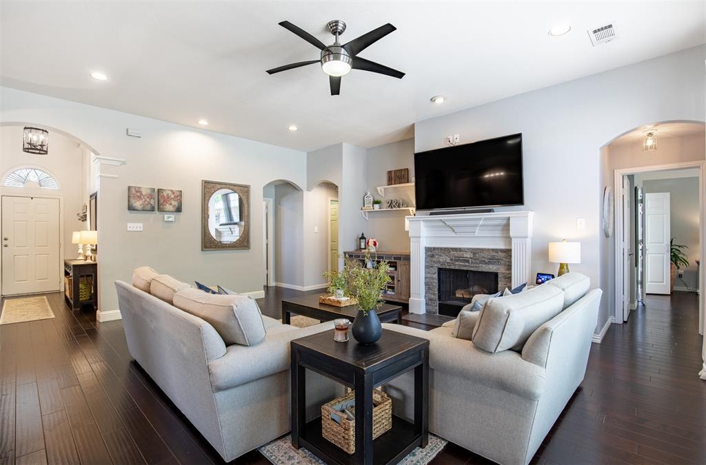 6425 Radslow Drive Frisco, TX 75035 - Photo 10 of 34 Living room with ceiling fan and recessed lighting.