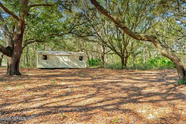 a view of outdoor space with yard