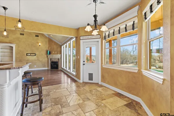 a view of a bathroom with a glass door
