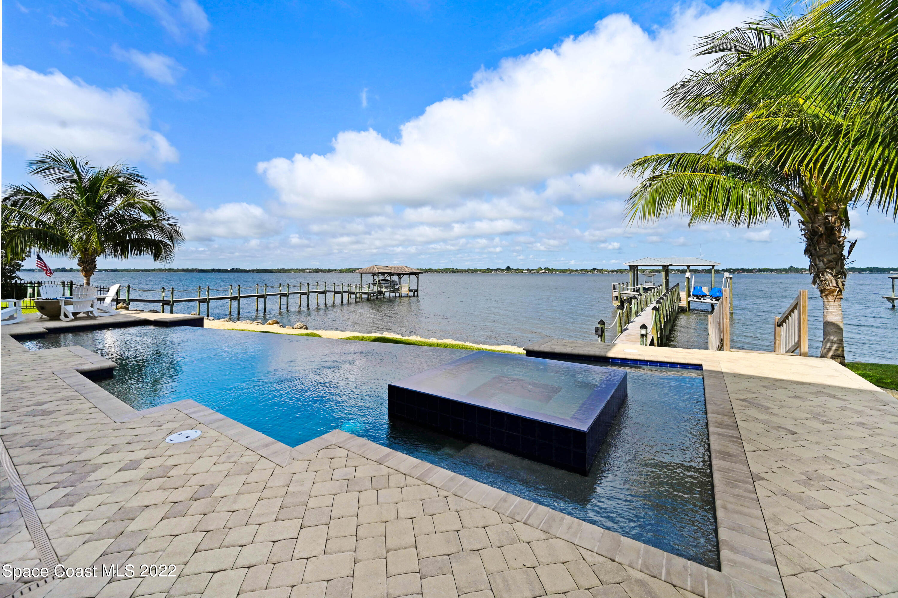 4325 Randon Lane Merritt Island, FL 32952 - Photo 15 of 68 Disappearing edge heated pool and spa