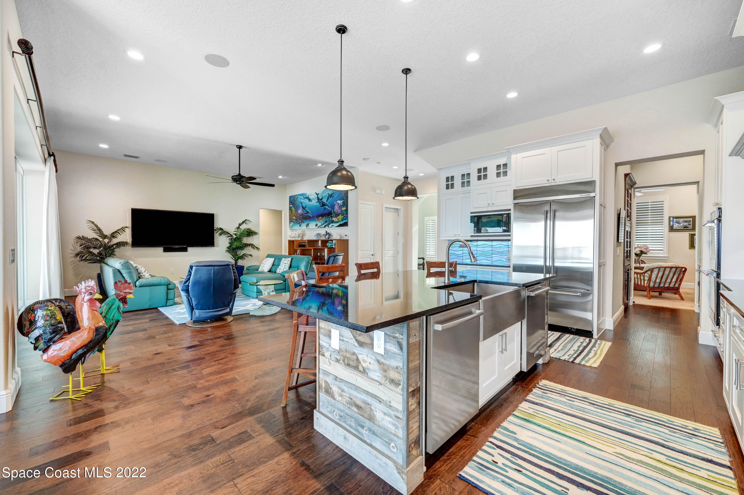4325 Randon Lane Merritt Island, FL 32952 - Photo 29 of 68 Kitchen and Family Room