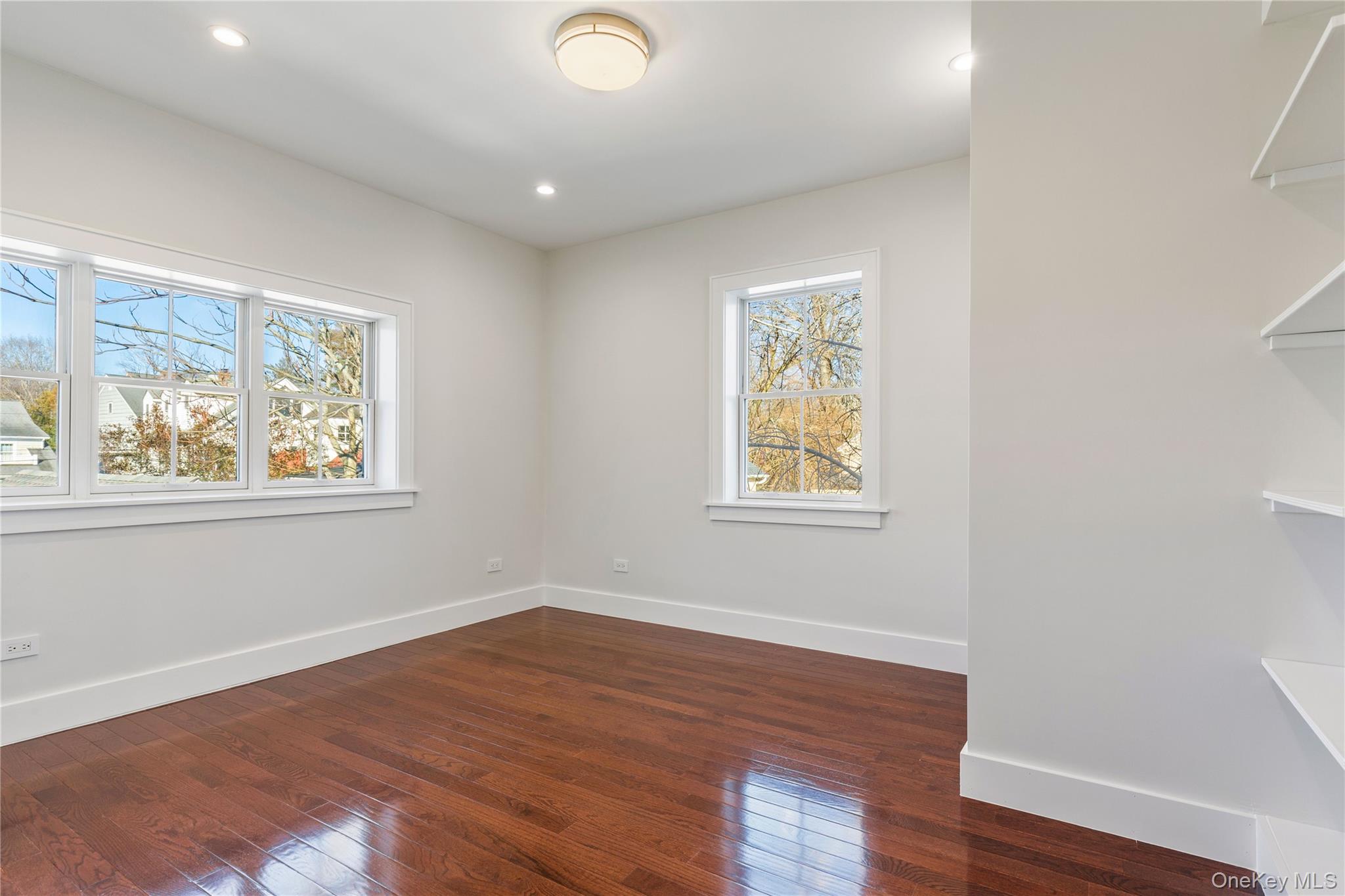 385 Midland Avenue, Unit 2 Rye, NY 10580 - Photo 14 of 20 a view of room with window and wooden floor