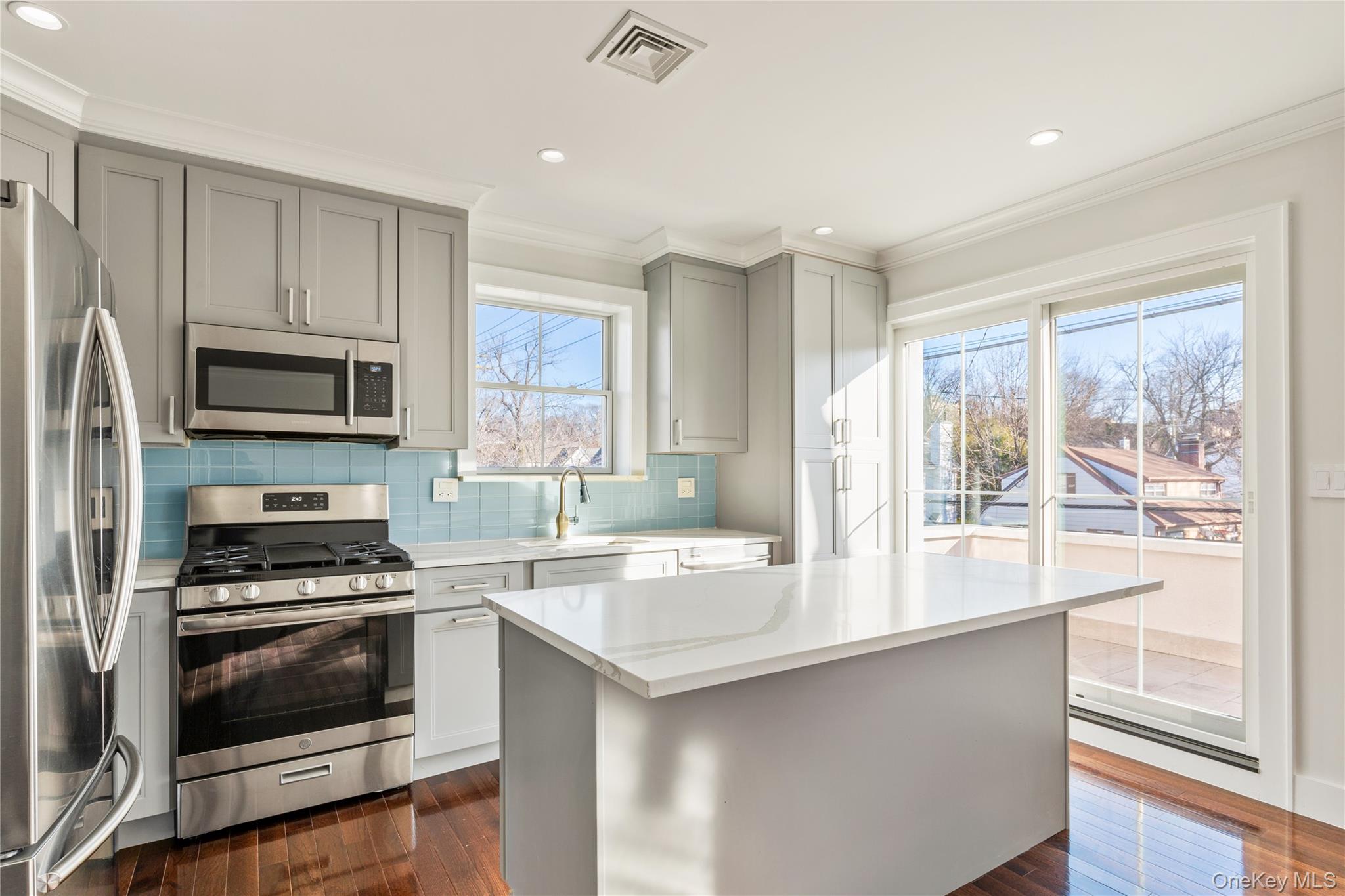 385 Midland Avenue, Unit 2 Rye, NY 10580 - Photo 5 of 20 a kitchen with a sink stove top oven and refrigerator