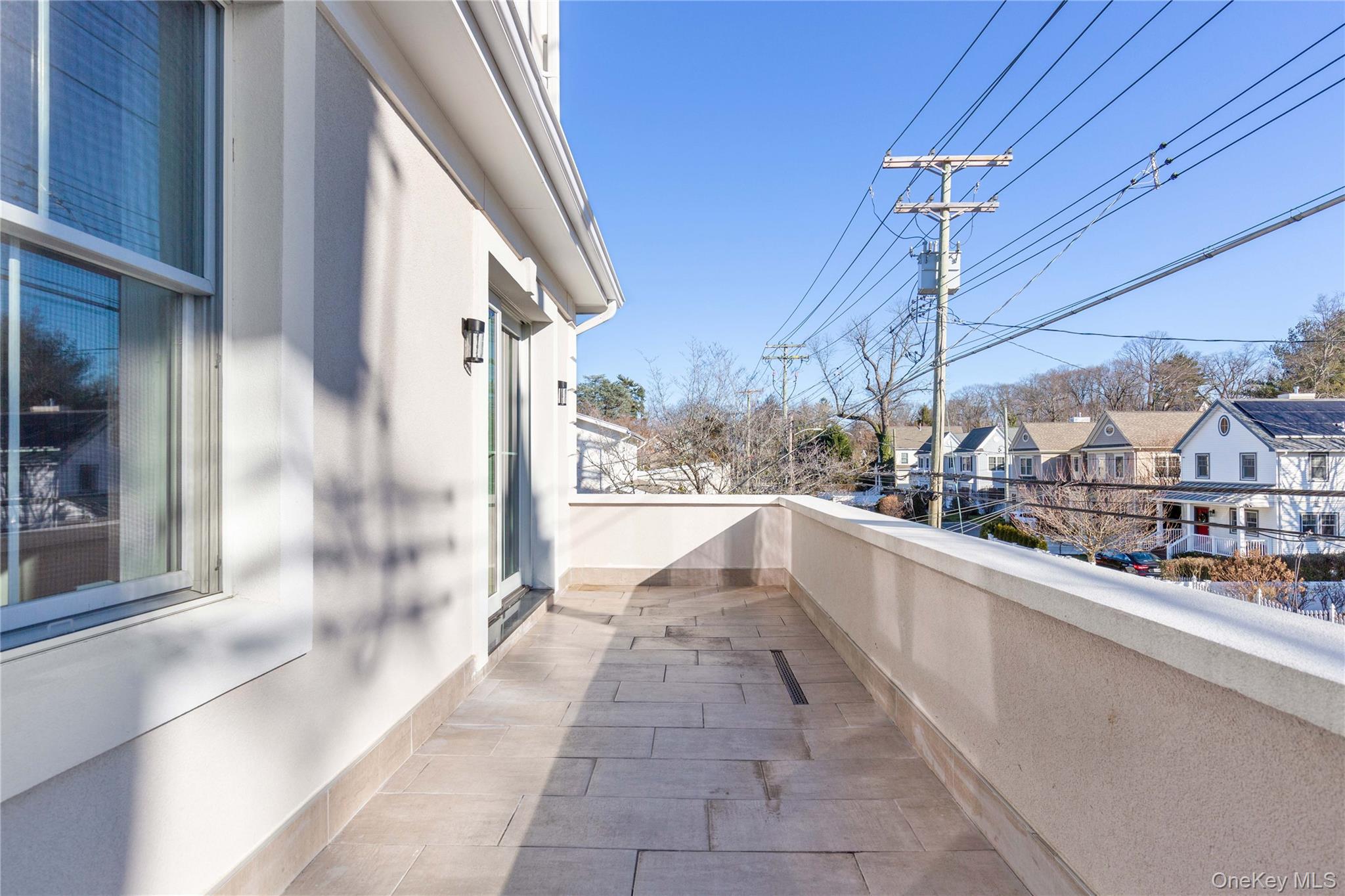 385 Midland Avenue, Unit 2 Rye, NY 10580 - Photo 9 of 20 a view of a city from a balcony