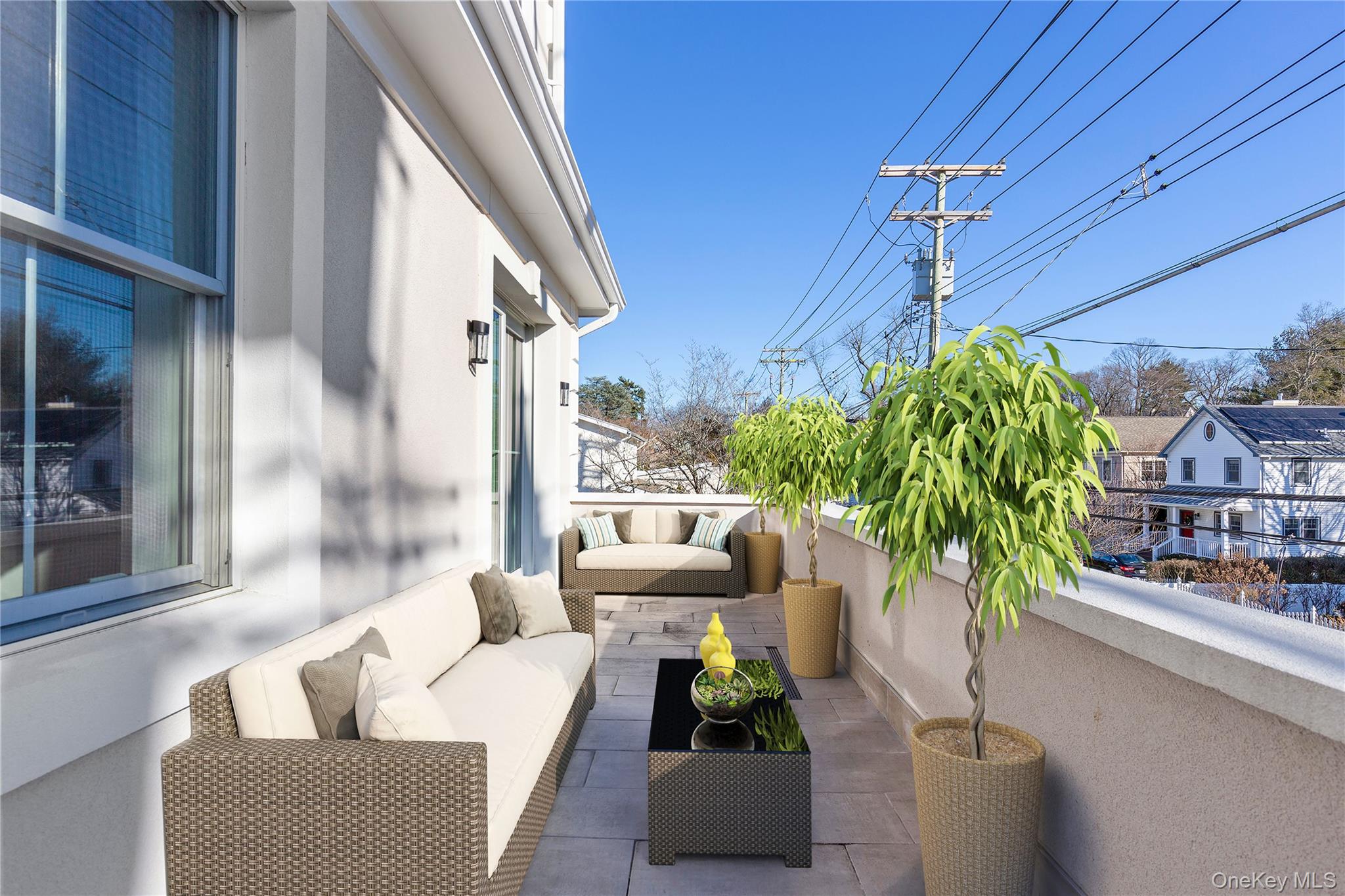 385 Midland Avenue, Unit 2 Rye, NY 10580 - Photo 10 of 20 a living room with furniture and a potted plant