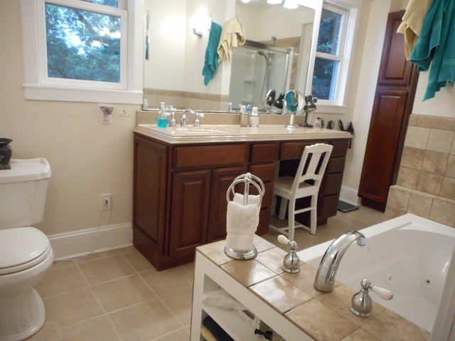 4766 Graham Road Somonauk, IL 60552 - Photo 12 of 25 a bathroom with a sink a toilet and mirror