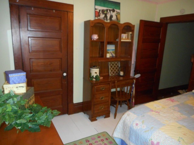 4766 Graham Road Somonauk, IL 60552 - Photo 14 of 25 a bedroom with a bed and a dresser in it