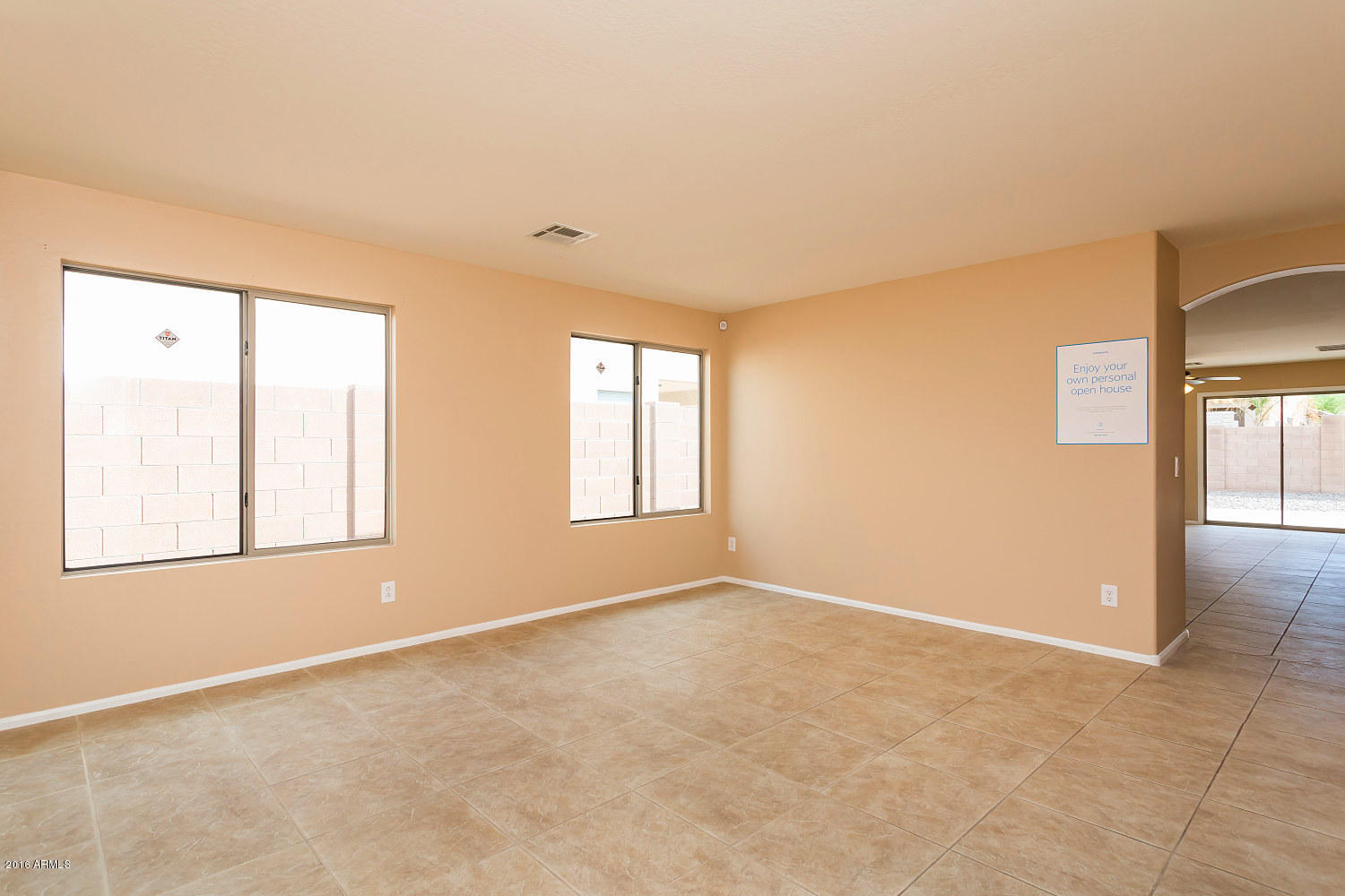 4625 West Carson Road Laveen, AZ 85339 - Photo 8 of 19 an empty room with windows