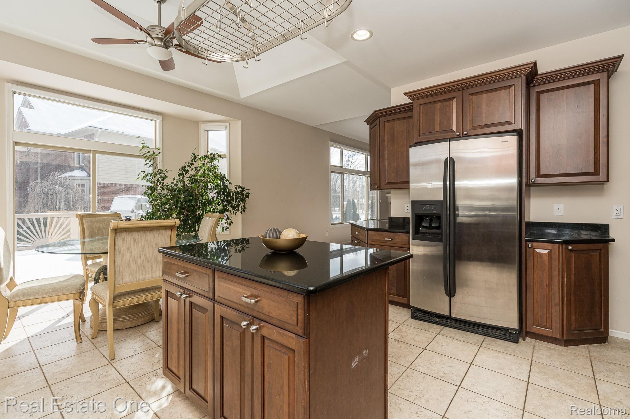 115 Scarborough Lane Rochester, MI 48306 - Photo 18 of 46 Island kitchen with stainless appliances
