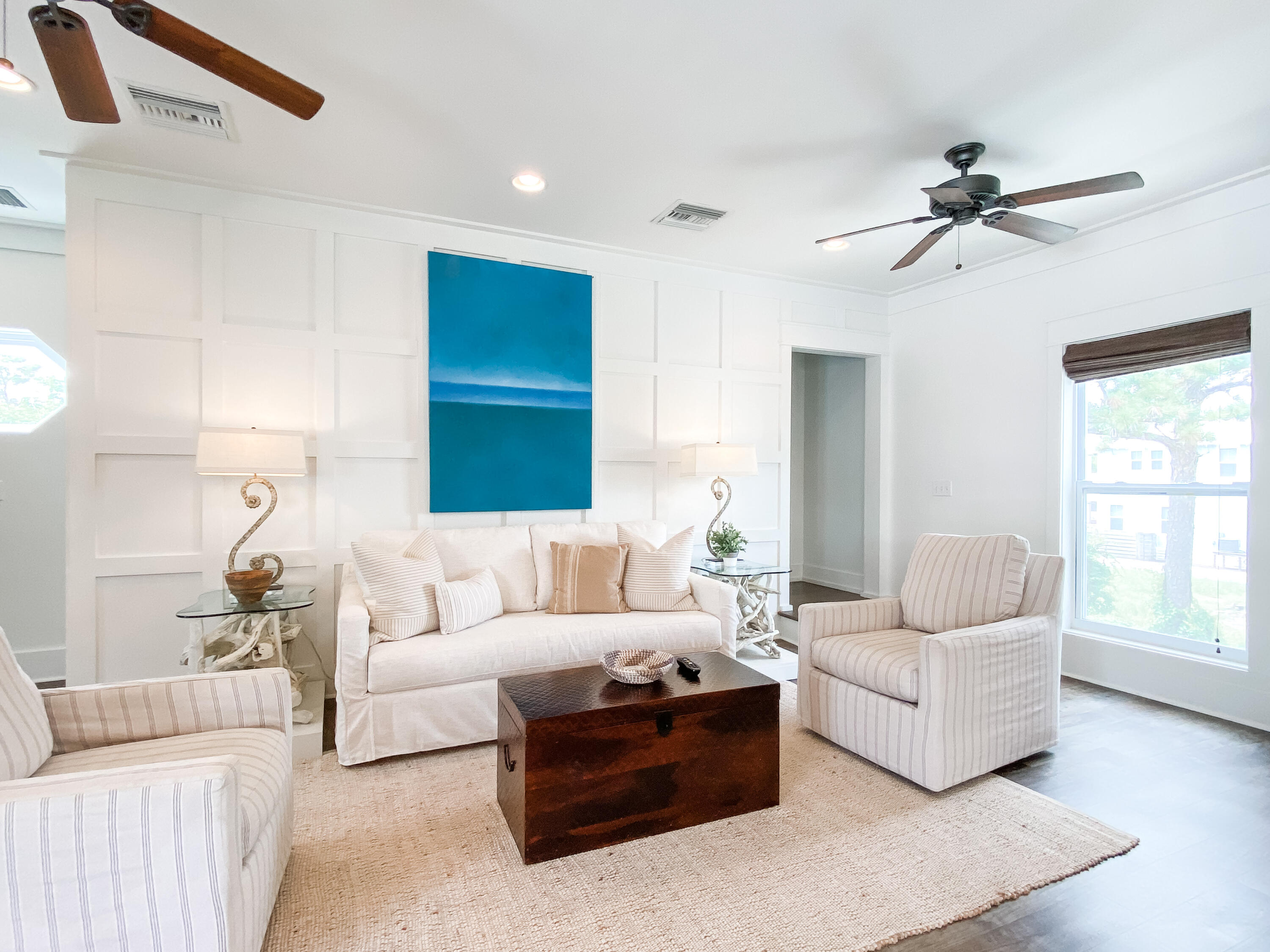 139 Brown Street Santa Rosa Beach, FL 32459 - Photo 11 of 45 a living room with furniture and a large window