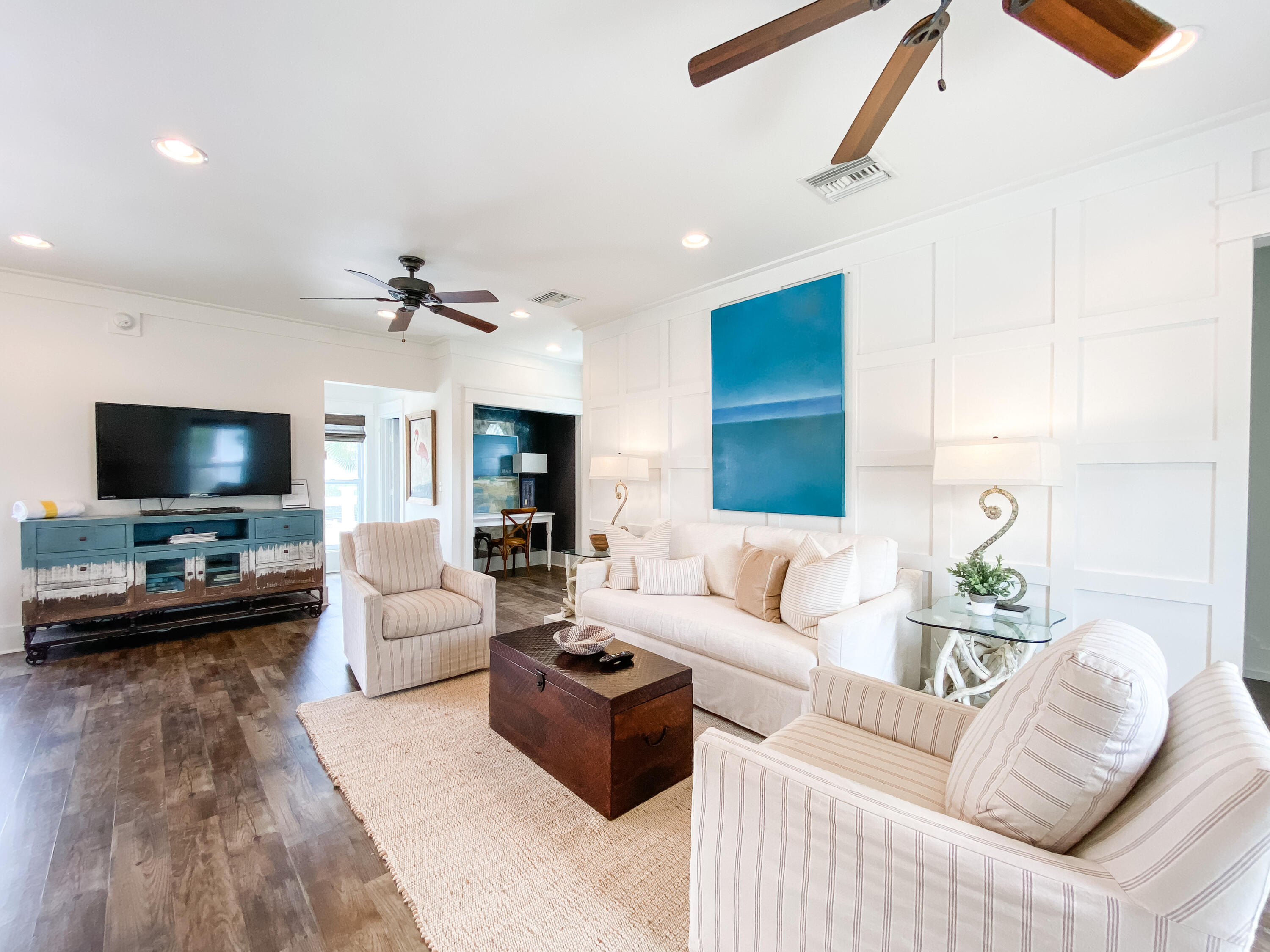 139 Brown Street Santa Rosa Beach, FL 32459 - Photo 15 of 45 a living room with furniture and a flat screen tv
