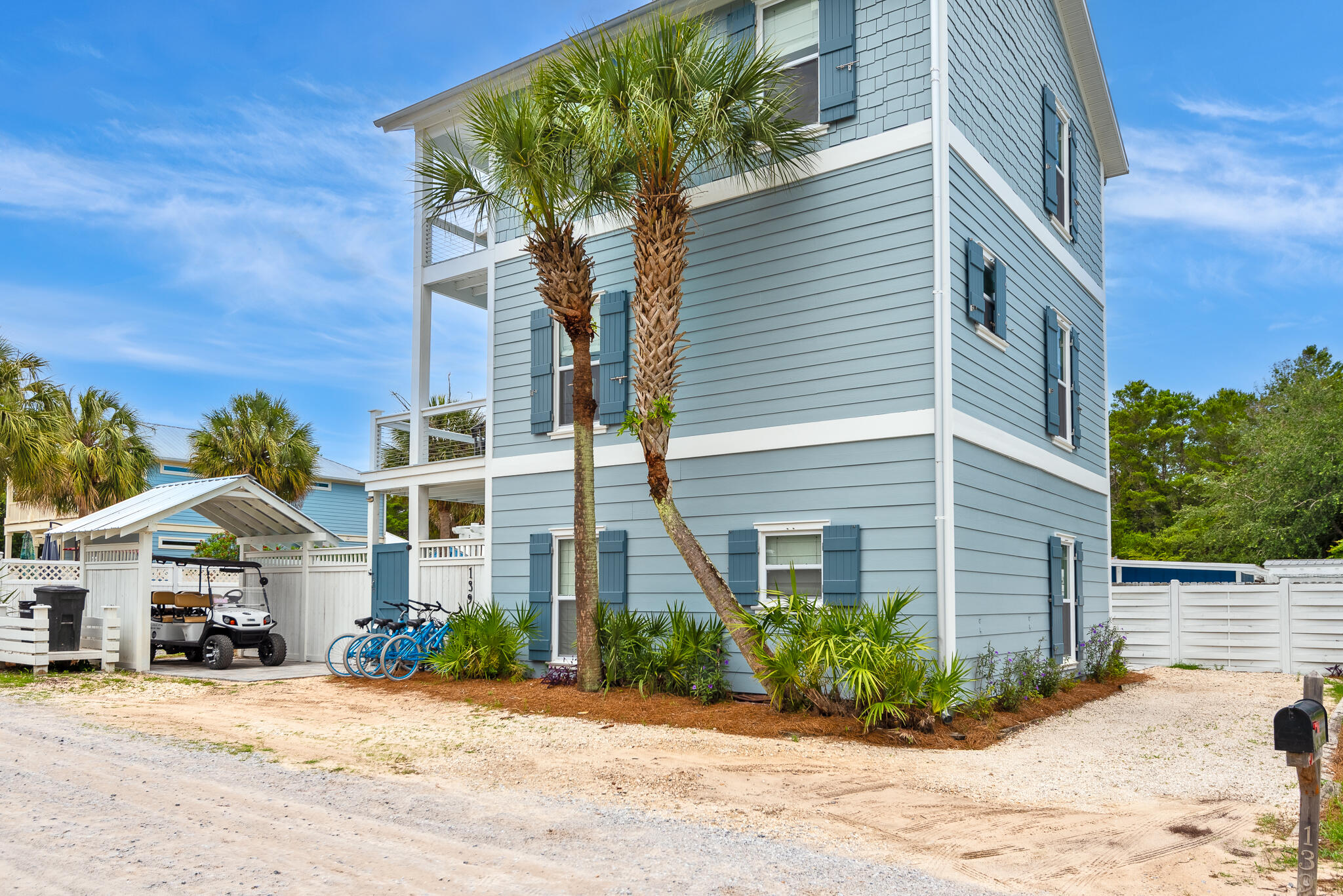 139 Brown Street Santa Rosa Beach, FL 32459 - Photo 2 of 45 a front view of a building with a yard