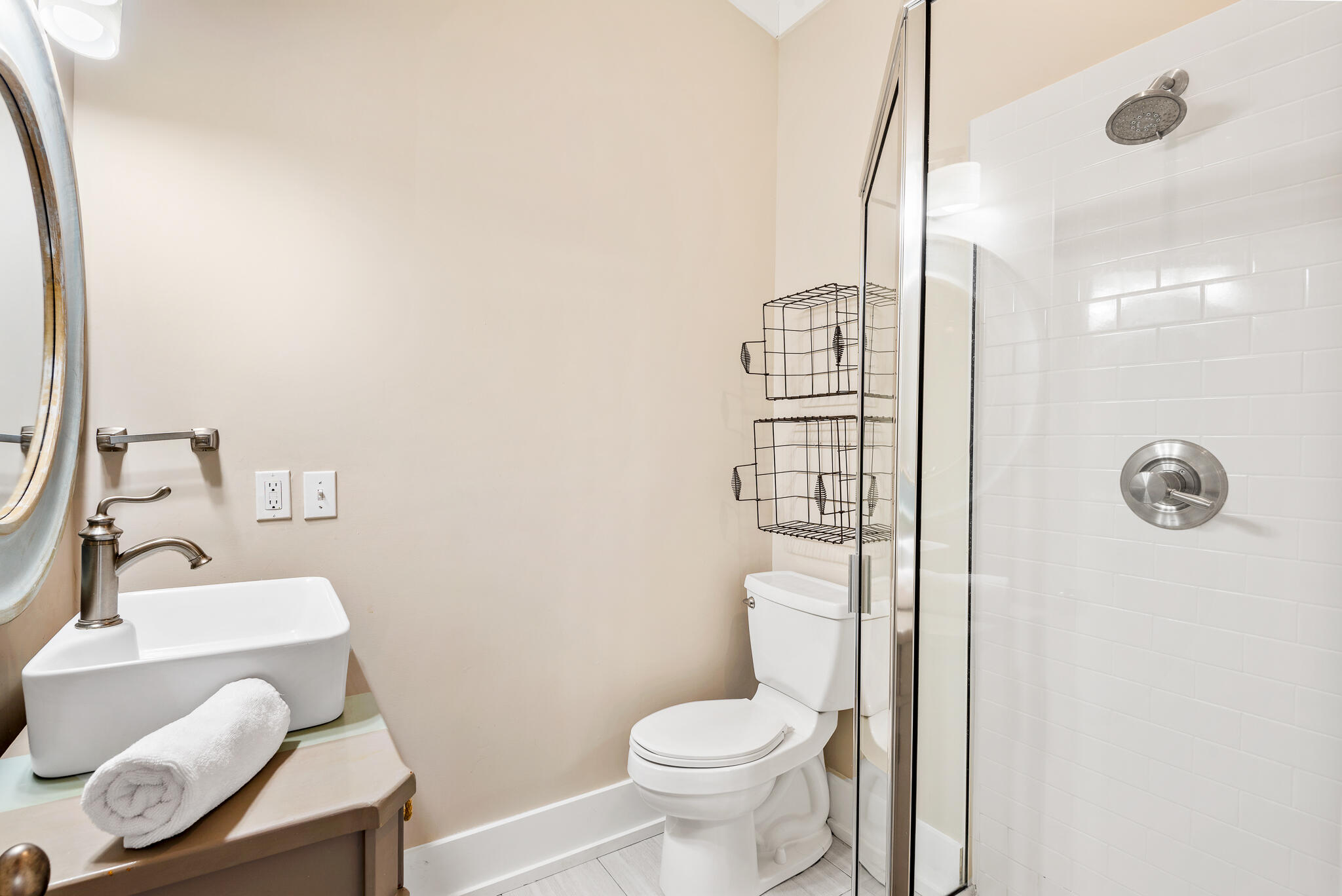 139 Brown Street Santa Rosa Beach, FL 32459 - Photo 25 of 45 a bathroom with a toilet a sink and shower