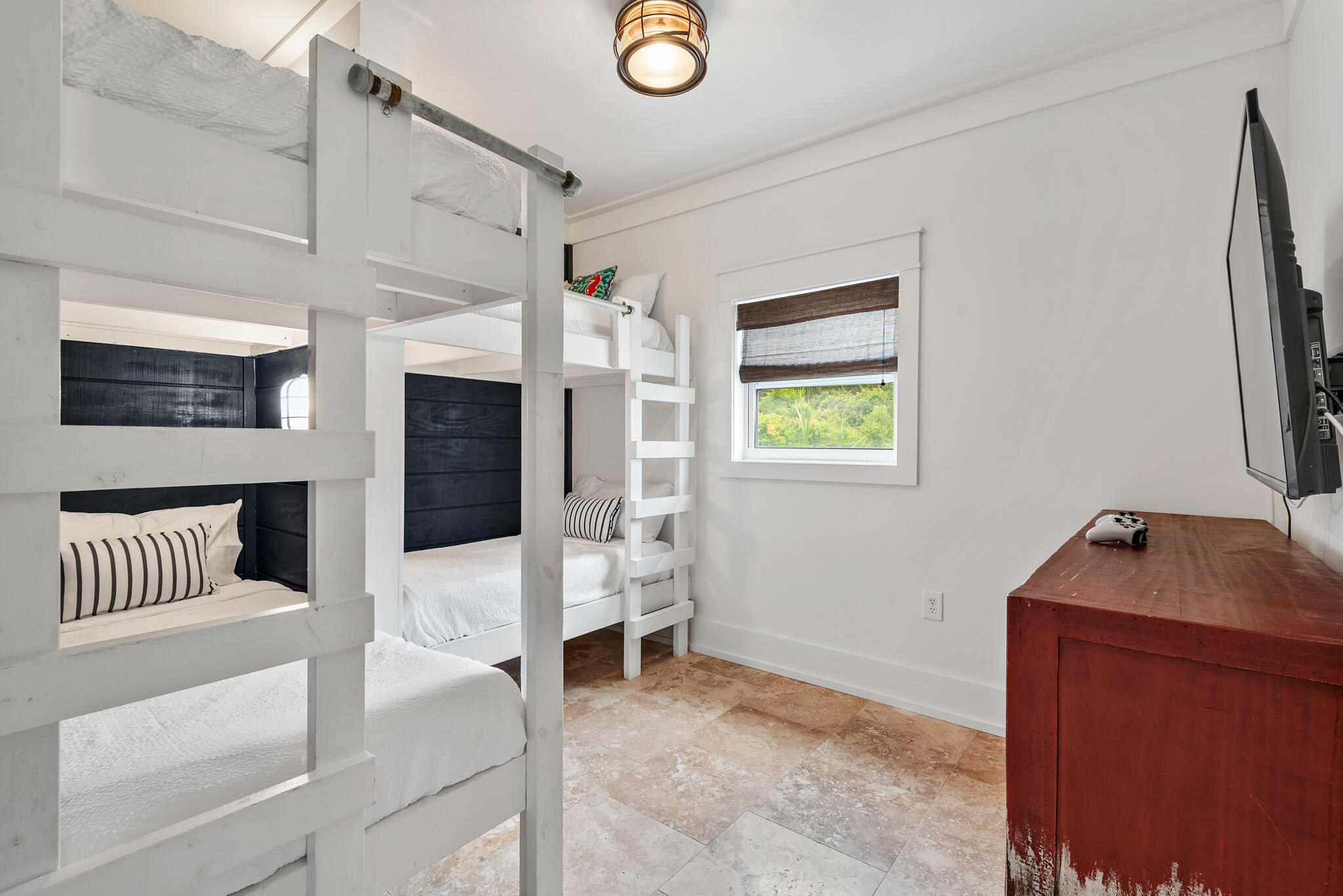 139 Brown Street Santa Rosa Beach, FL 32459 - Photo 34 of 45 a bedroom with furniture and a window