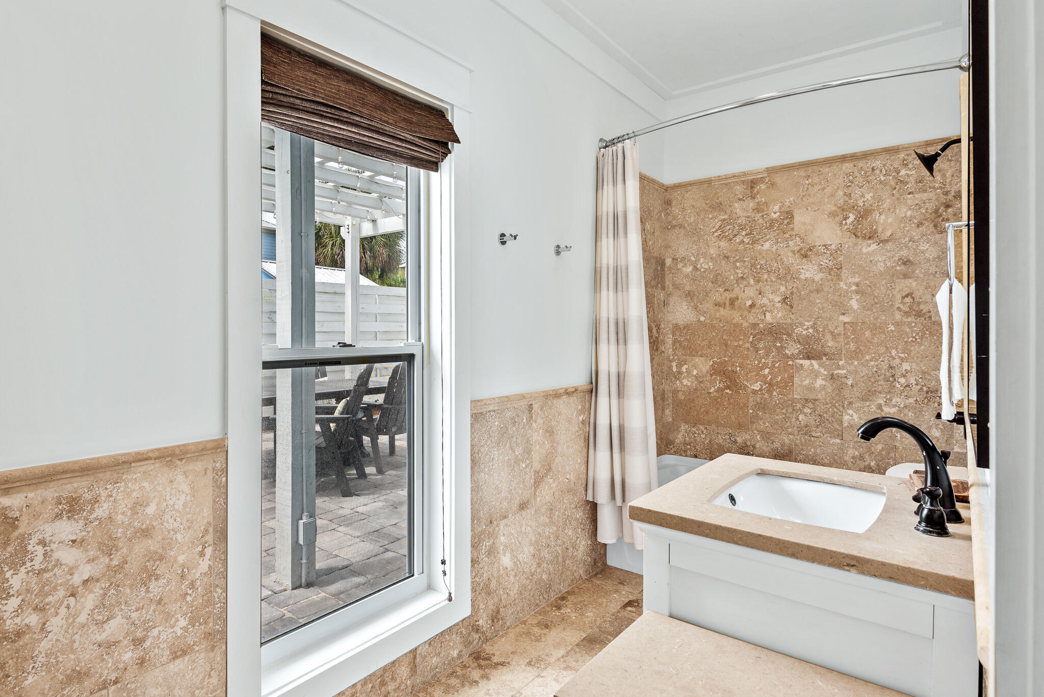 139 Brown Street Santa Rosa Beach, FL 32459 - Photo 35 of 45 a bathroom with a bathtub and a shower