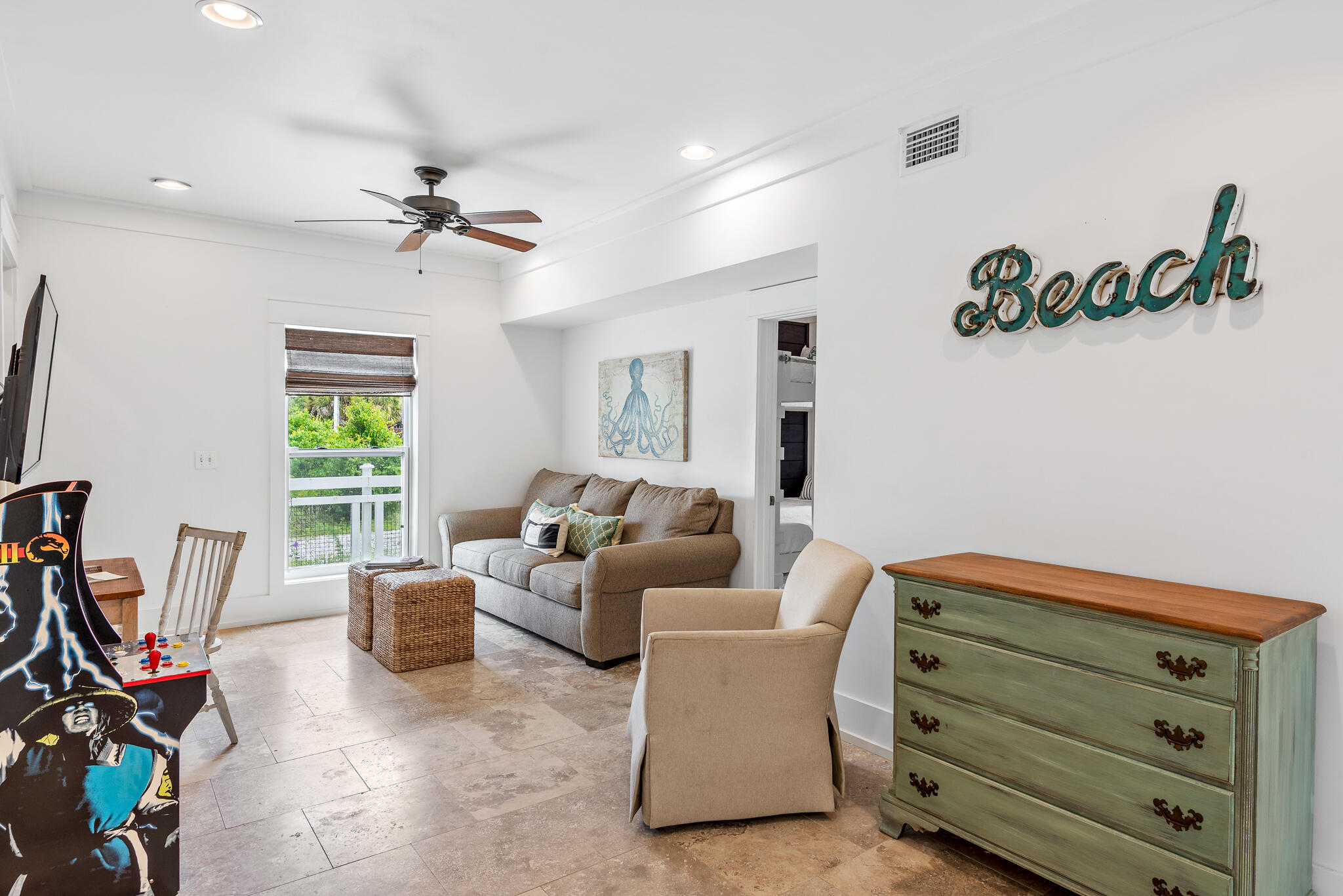 139 Brown Street Santa Rosa Beach, FL 32459 - Photo 36 of 45 a living room with furniture gym equipment and a window