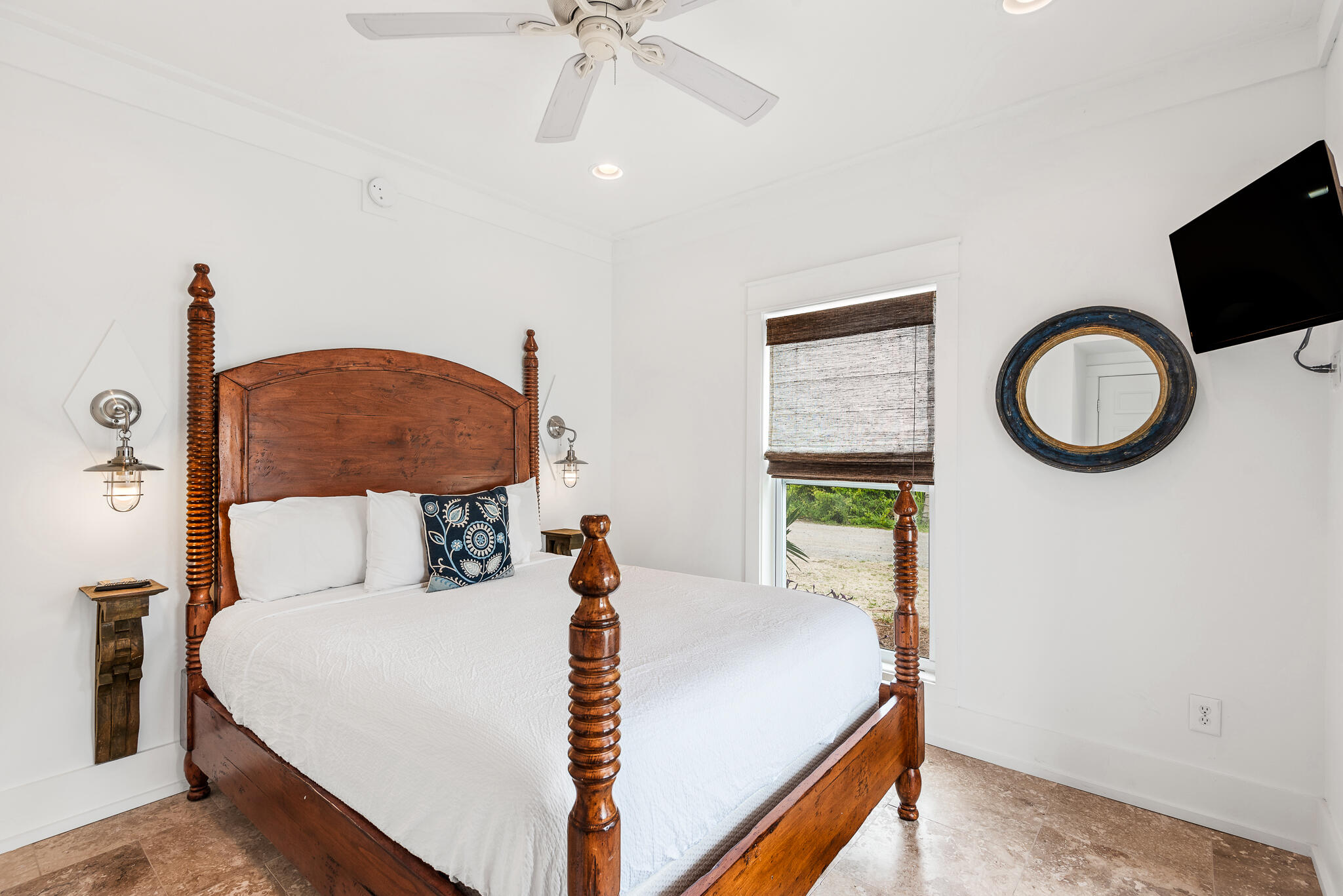 139 Brown Street Santa Rosa Beach, FL 32459 - Photo 37 of 45 a bed room with a bed and a chandelier