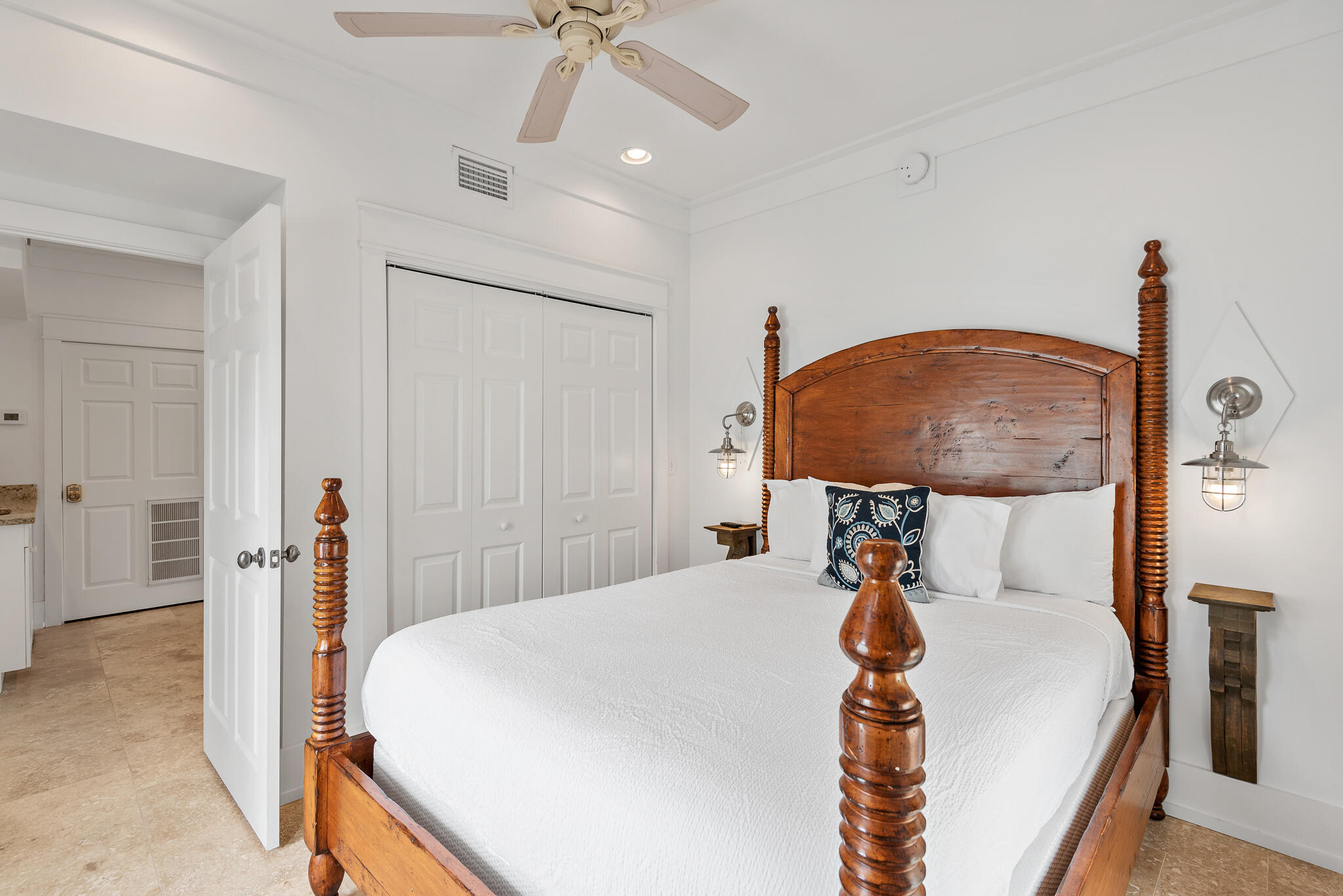 139 Brown Street Santa Rosa Beach, FL 32459 - Photo 38 of 45 a bed room with a bed and a chandelier