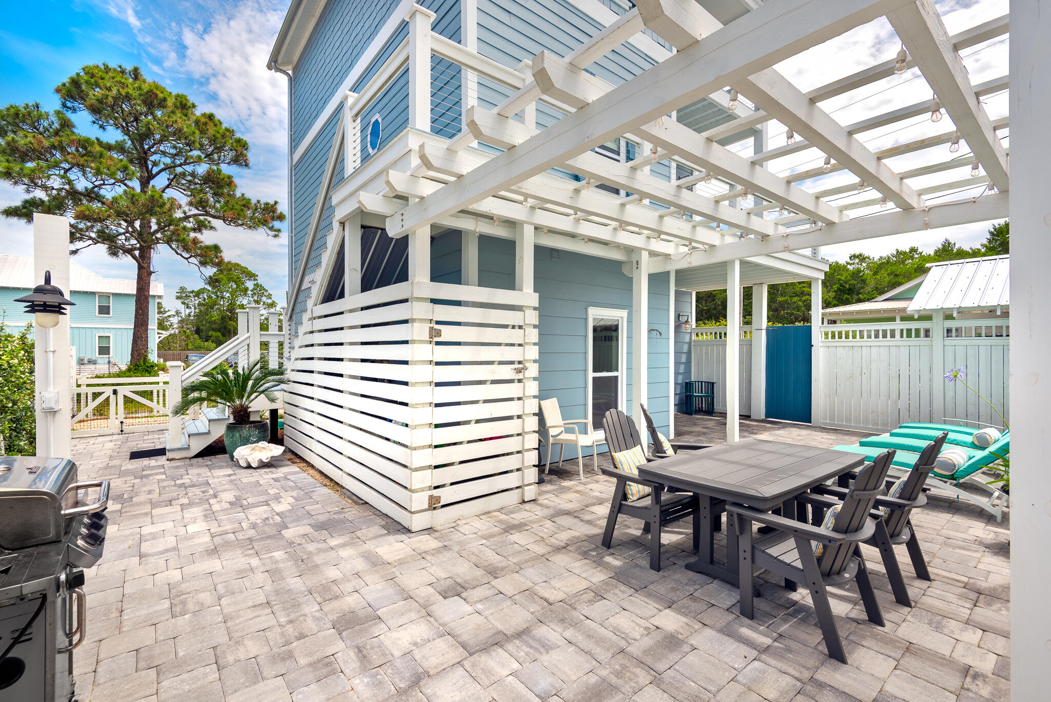 139 Brown Street Santa Rosa Beach, FL 32459 - Photo 8 of 45 a view of a dinning table and chairs in the patio