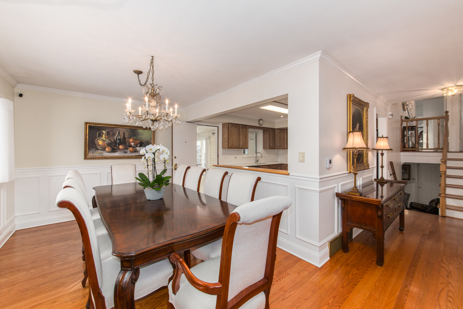 1026 Fortuna Avenue Park Ridge, IL 60068 - Photo 14 of 43 a view of a dining room with furniture and wooden floor